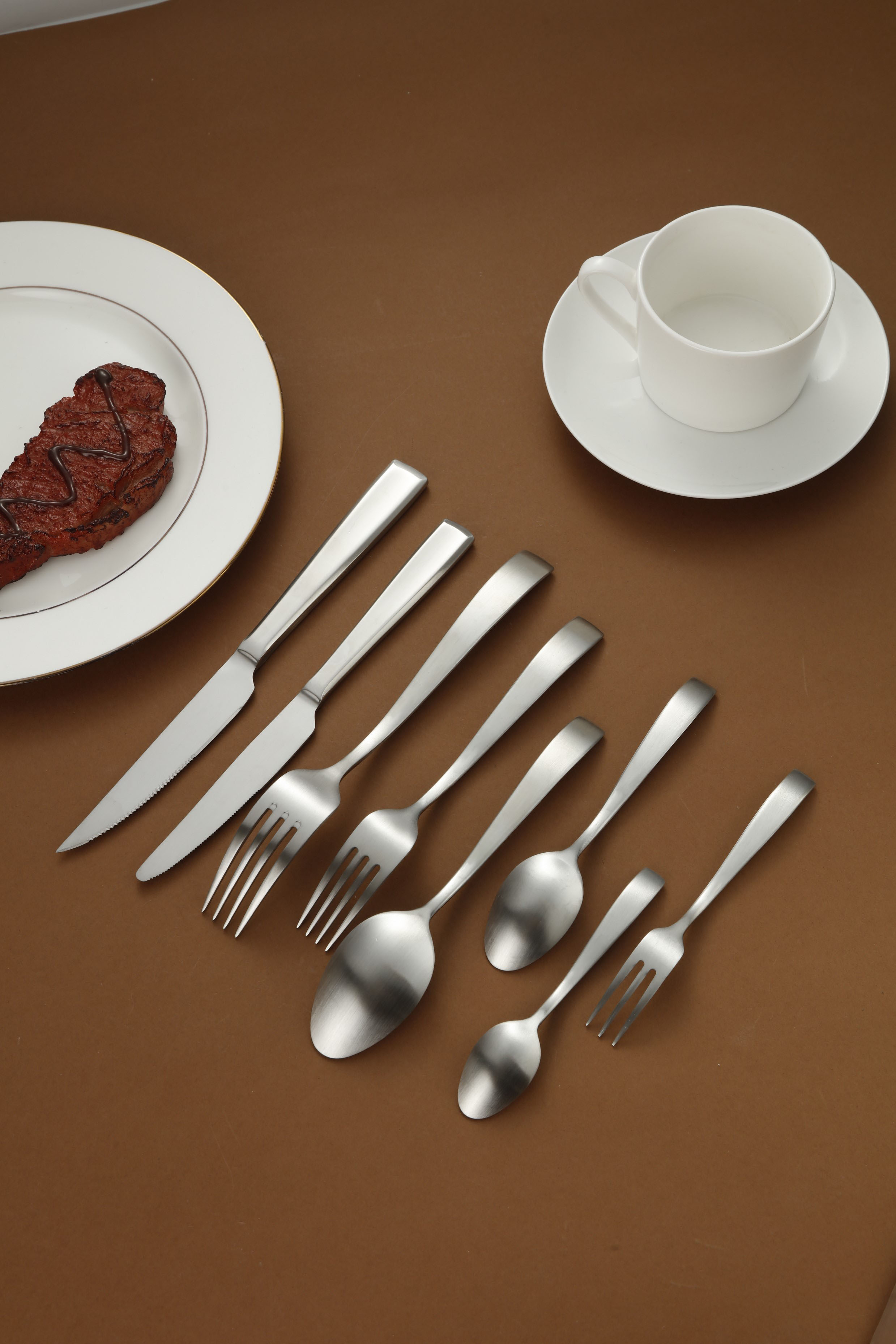 Matte Silver Curved Handle Stainless Steel Flatware Set 4